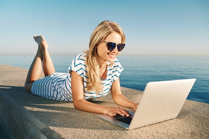 woman browsing on laptop