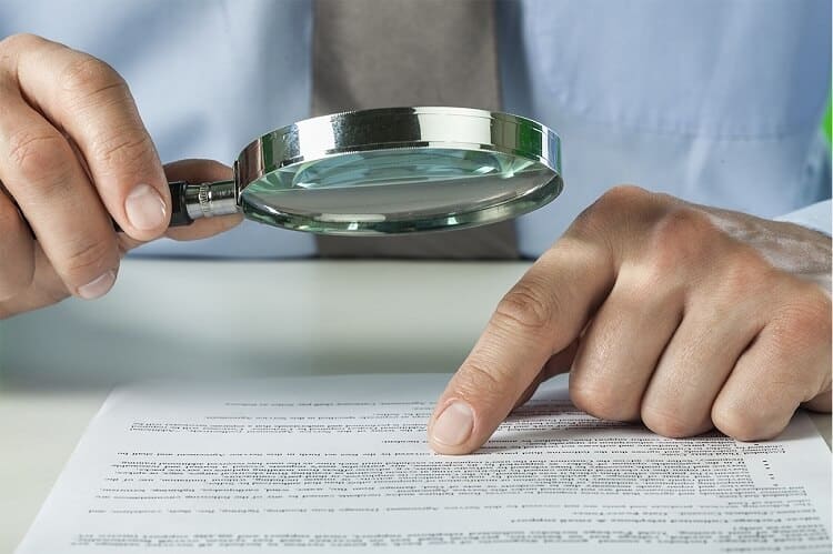 people analytics person's hand on document