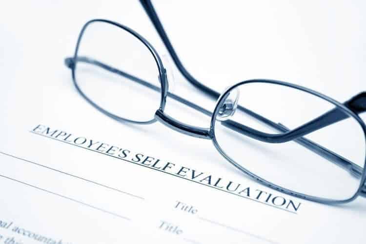 employee self evaluation form with glasses